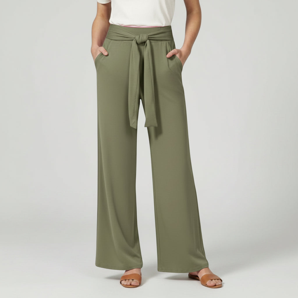 Green relaxed wide-leg trousers with tie waist and draped front.