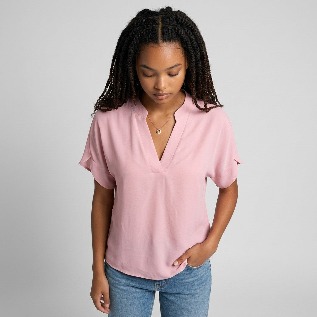 Light pink lightweight chiffon blouse with V-neck and short draped sleeves