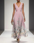 Pink sleeveless V-neck maxi dress with floral panel hem and gathered waist