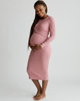 Pink ribbed maternity midi dress with long sleeves and wrap-front crossover bodice