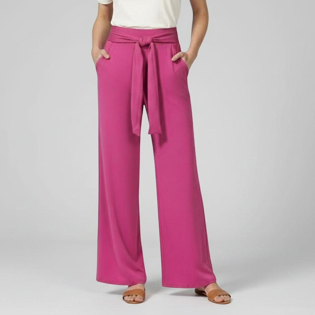 Purple relaxed wide-leg trousers with tie waist and draped front.