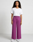 Purple smocked high-waist wide-leg pants with gathered elastic waistband