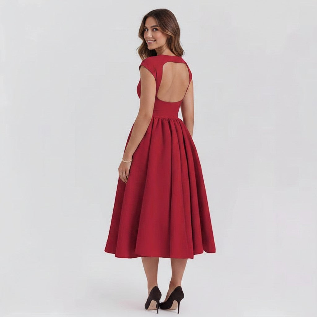 Red cap-sleeve midi dress with fitted waist and full gathered skirt