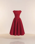Red cap-sleeve midi dress with fitted bodice and pleated gathered skirt