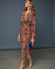 Red patterned maxi A-line dress with V-neck, tie waist, long sleeves