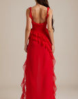 Red maxi dress with thin straps and back ruffle detailing, layered skirt