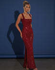 Embellished evening gown with square neckline, sleeveless straps, and long column fit in deep red.