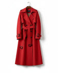 Red trench coat with double-breasted front, belted waist, and structured shoulder details.