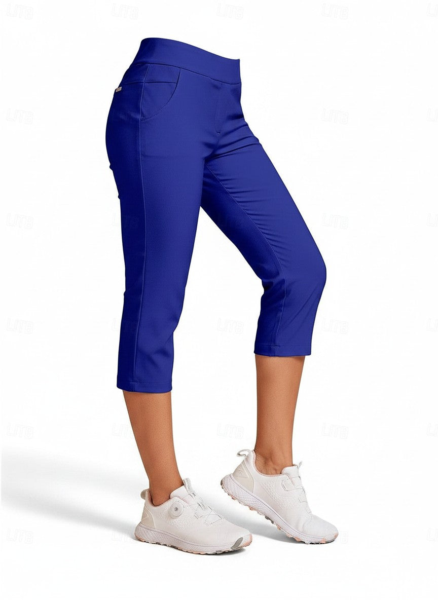 Blue capri pants side view, mid-rise pull-on waist and cropped tapered legs