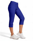 Blue capri pants side view, mid-rise pull-on waist and cropped tapered legs