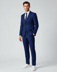 Navy men's slim-fit linen suit, 2-piece blazer and trousers, side profile.