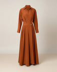 Orange midi shirt dress with three-quarter sleeves, button front, belted waist