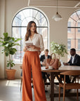 Rust orange linen-blend wide-leg trousers, high-waist with elastic waistband and wide legs