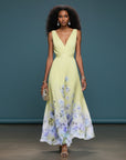Light green sleeveless V-neck maxi dress with floral panel hem and gathered waist