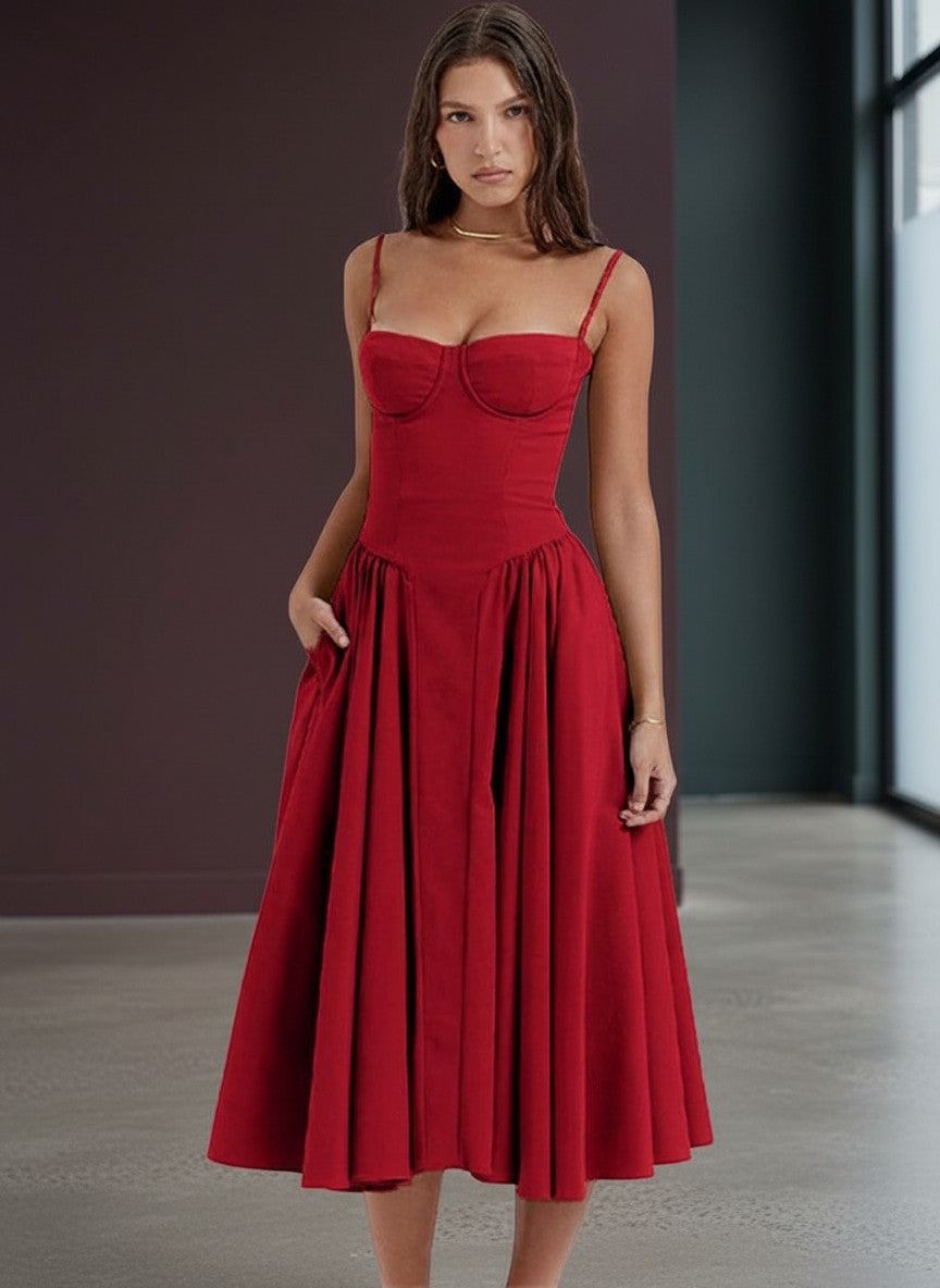 Red fitted midi dress with adjustable spaghetti straps and gathered pleated skirt