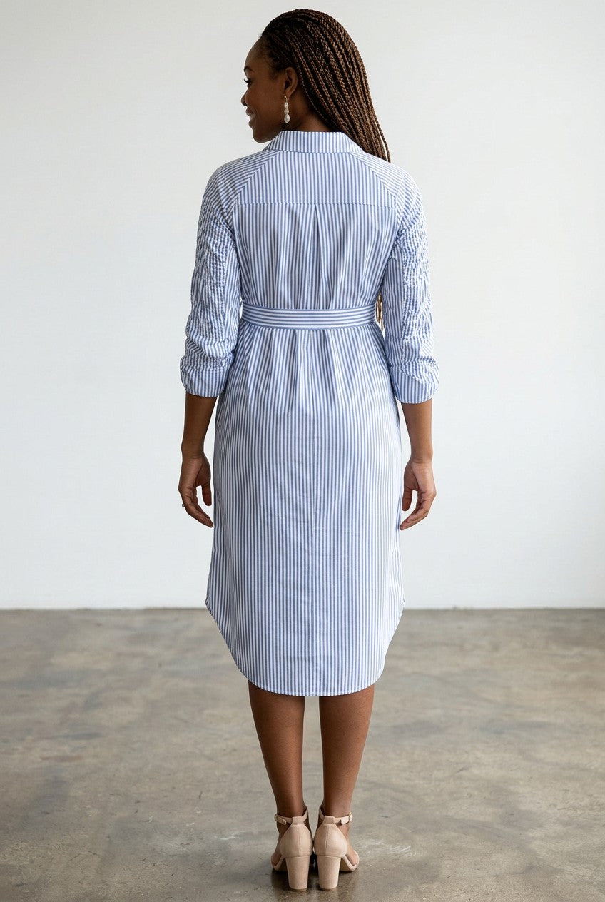 Blue striped maternity shirt dress, back view with belted tie waist