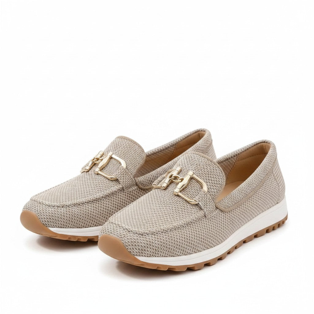 Beige mesh slip-on loafers with gold bit hardware and tan grippy outsole.