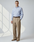 Men's high-waisted straight-leg tailored trousers in tan, front full-body view