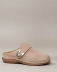 Light beige slip-on mules with metal buckle accent and perforated upper.