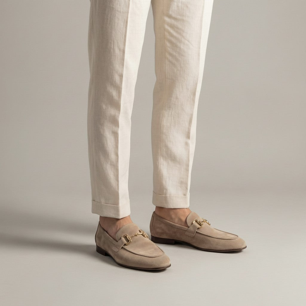 Beige suede loafers with horsebit detail and almond toe, slip-on style