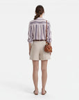 Women’s cotton vertical stripe blouse, back view, button-front detail, cuffed sleeves