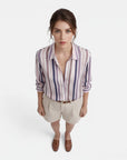 Women’s cotton vertical stripe blouse with button-front and pointed collar, rolled sleeves