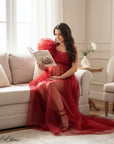 Red sheer tulle maternity dress with layered skirt and off-shoulder puff accents