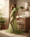 Light green sheer tulle maternity dress with ruched bodice and flowing full skirt