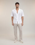 Men's white knit short-sleeve button-up shirt, open collar, textured pattern