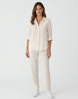 White linen-cotton blend button-up shirt with collar and three-quarter sleeves