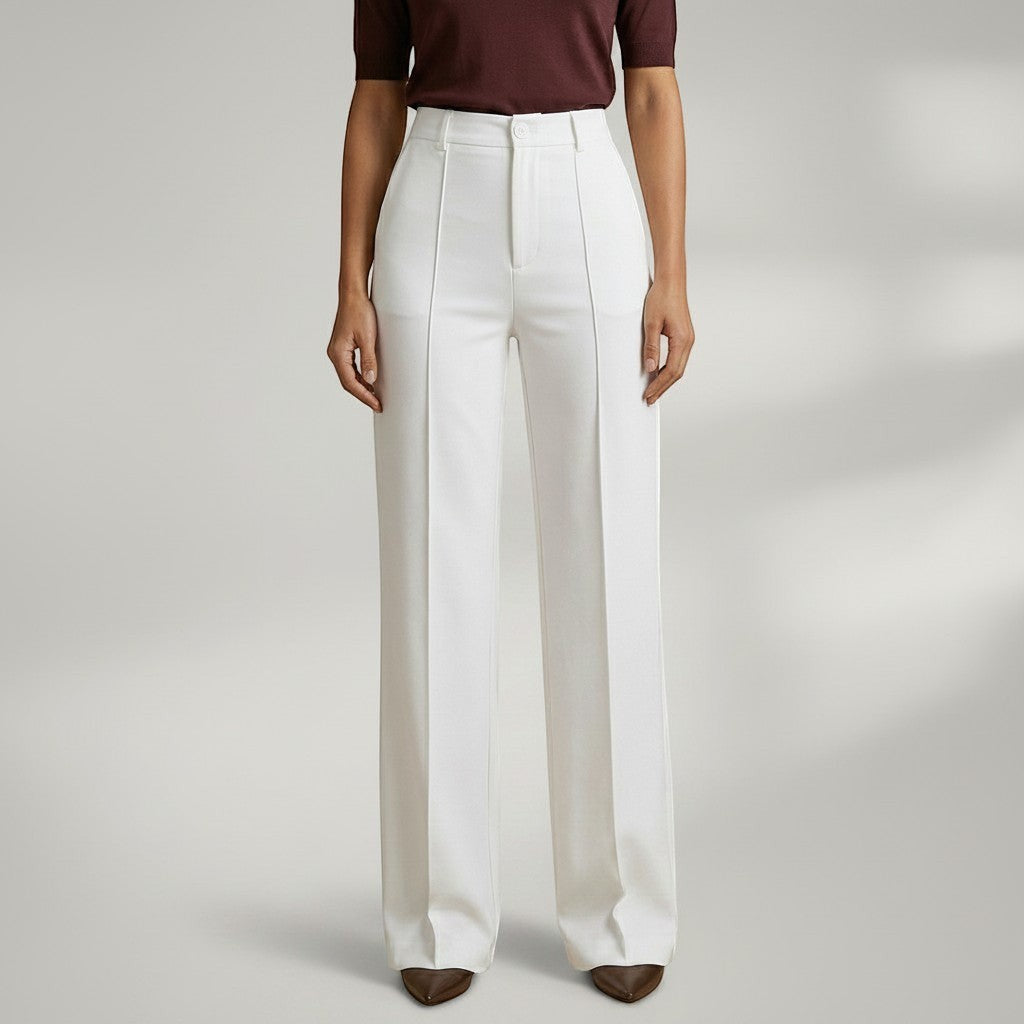 High-waist tailored trousers in white with belt loops and front button closure