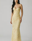 Floral corset gown with spaghetti straps and mermaid silhouette, gold embroidery