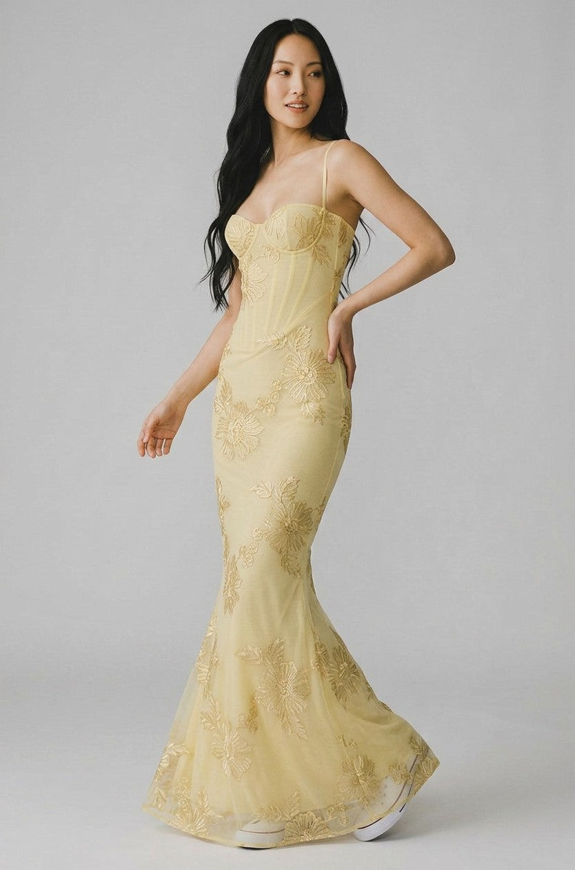 Floral embroidered corset gown with spaghetti straps, fitted bodice, gold mermaid