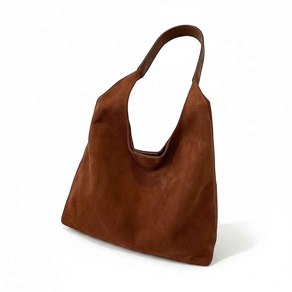 Brown suede shoulder bag with open top and short curved handle.